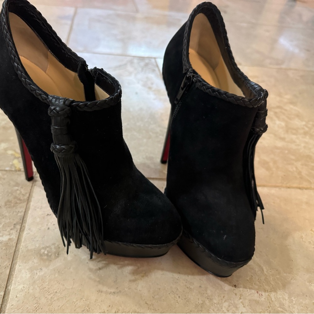 Louboutin suede and leather booties. Size 7.5, yet fit my 6.5 foot.Brand new.